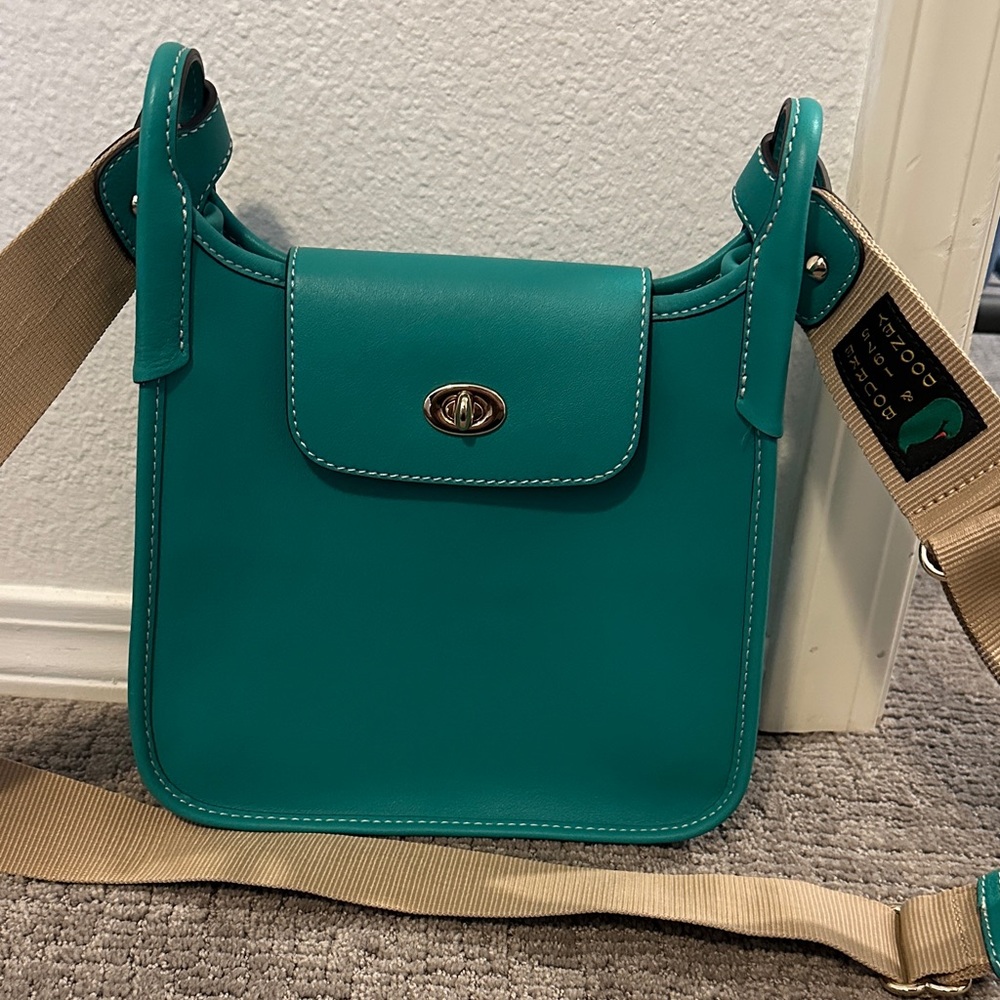 Dooney & Bourke Turquoise Crossbody Bag with Tan Strap